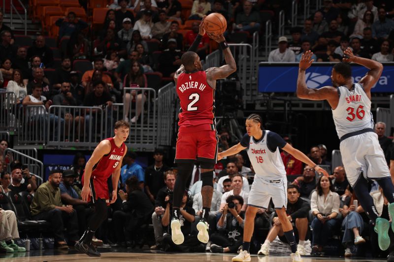 MIAMI, FL - MARCH 3:  Terry Rozier #2 of the Miami Heat shoots a three point basket during the game against the Washington Wizards on March 3, 2025 at Kaseya Center in Miami, Florida. NOTE TO USER: User expressly acknowledges and agrees that, by downloading and or using this Photograph, user is consenting to the terms and conditions of the Getty Images License Agreement. Mandatory Copyright Notice: Copyright 2025 NBAE (Photo by Issac Baldizon/NBAE via Getty Images)