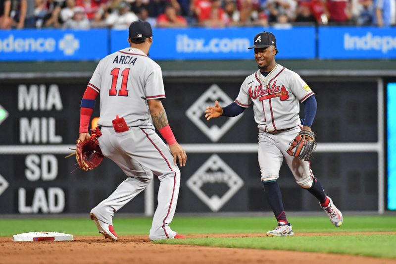 Sep 13, 2023; Philadelphia, Pennsylvania, USA; Atlanta Braves shortstop Orlando Arcia (11) and second baseman Ozzie Albies (1) celebrate their 6th straight National League East title with win against the Philadelphia Phillies at Citizens Bank Park.  Mandatory Credit: Eric Hartline-USA TODAY Sports