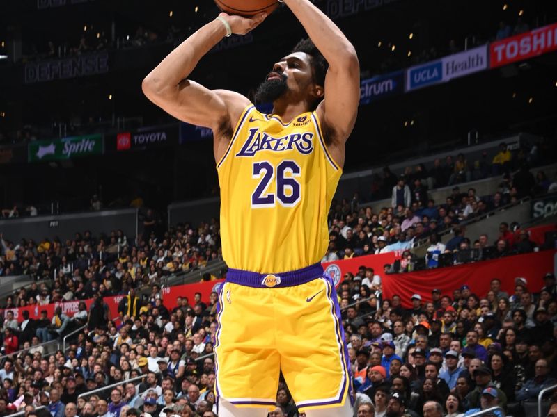 LOS ANGELES, CA - FEBRUARY 28: Spencer Dinwiddie #26 of the Los Angeles Lakers shoots the ball during the game against the LA Clippers on February 28, 2024 at Crypto.Com Arena in Los Angeles, California. NOTE TO USER: User expressly acknowledges and agrees that, by downloading and/or using this Photograph, user is consenting to the terms and conditions of the Getty Images License Agreement. Mandatory Copyright Notice: Copyright 2024 NBAE (Photo by Andrew D. Bernstein/NBAE via Getty Images)