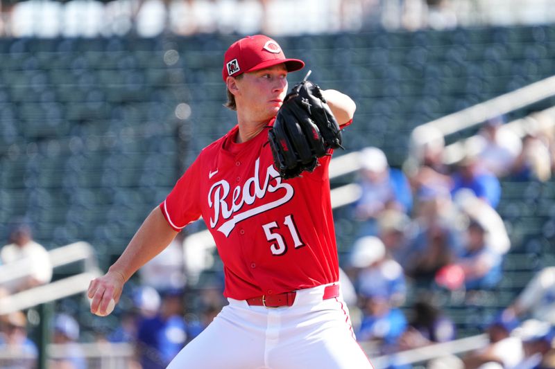 Feb 24, 2025; Goodyear, Arizona, USA; Cincinnati Reds pitcher Brady Singer (51) pitches against the Los Angeles Dodgers during the first inning at Goodyear Ballpark. Mandatory Credit: Joe Camporeale-Imagn Images