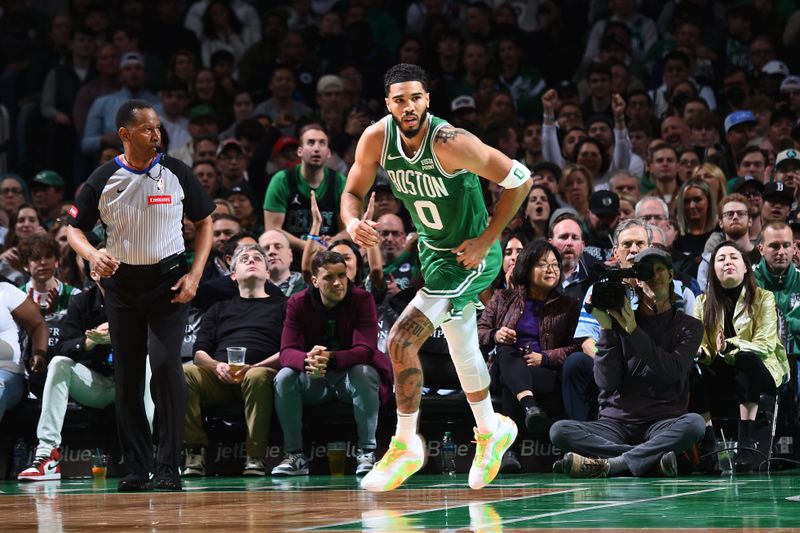 BOSTON, MA - APRIL 5: Jayson Tatum #0 of the Boston Celtics looks on during the game against the Sacramento Kings  on April 5, 2024 at the TD Garden in Boston, Massachusetts. NOTE TO USER: User expressly acknowledges and agrees that, by downloading and or using this photograph, User is consenting to the terms and conditions of the Getty Images License Agreement. Mandatory Copyright Notice: Copyright 2024 NBAE  (Photo by Brian Babineau/NBAE via Getty Images)