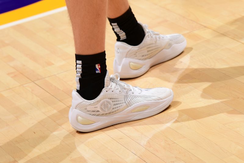 LOS ANGELES, CA - JANUARY 9: The sneakers worn by Austin Reaves #15 of the Los Angeles Lakers before the game against the Toronto Raptors on January 9, 2024 at Crypto.Com Arena in Los Angeles, California. NOTE TO USER: User expressly acknowledges and agrees that, by downloading and/or using this Photograph, user is consenting to the terms and conditions of the Getty Images License Agreement. Mandatory Copyright Notice: Copyright 2024 NBAE (Photo by Adam Pantozzi/NBAE via Getty Images)