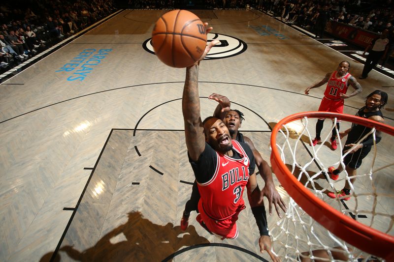 BROOKLYN, NY - MARCH 29: Andre Drummond #3 of the Chicago Bulls drives to the basket during the game against the Brooklyn Nets on March 29, 2024 at Barclays Center in Brooklyn, New York. NOTE TO USER: User expressly acknowledges and agrees that, by downloading and or using this Photograph, user is consenting to the terms and conditions of the Getty Images License Agreement. Mandatory Copyright Notice: Copyright 2024 NBAE (Photo by Nathaniel S. Butler/NBAE via Getty Images)