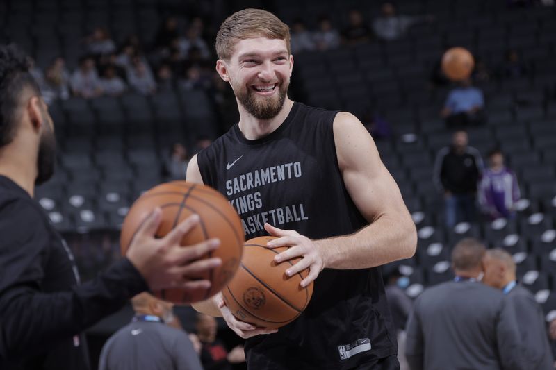 SACRAMENTO, CA - JANUARY 5: Domantas Sabonis #10 of the Sacramento Kings warms up before the game against the Toronto Raptors on January 5, 2024 at Golden 1 Center in Sacramento, California. NOTE TO USER: User expressly acknowledges and agrees that, by downloading and or using this Photograph, user is consenting to the terms and conditions of the Getty Images License Agreement. Mandatory Copyright Notice: Copyright 2024 NBAE (Photo by Rocky Widner/NBAE via Getty Images)