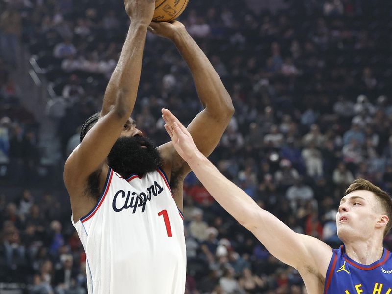 INGLEWOOD, CALIFORNIA - DECEMBER 01:  James Harden #1 of the LA Clippers takes a shot against Christian Braun #0 of the Denver Nuggets in the first half at Intuit Dome on December 01, 2024 in Inglewood, California.  NOTE TO USER: User expressly acknowledges and agrees that, by downloading and or using this photograph, User is consenting to the terms and conditions of the Getty Images License Agreement. (Photo by Ronald Martinez/Getty Images)