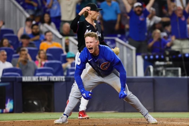 Aug 23, 2024; Miami, Florida, USA; Chicago Cubs center fielder Pete Crow-Armstrong (52) reacts after hitting an inside-the-park home run against the Miami Marlins during the third inning at loanDepot Park. Mandatory Credit: Sam Navarro-USA TODAY Sports