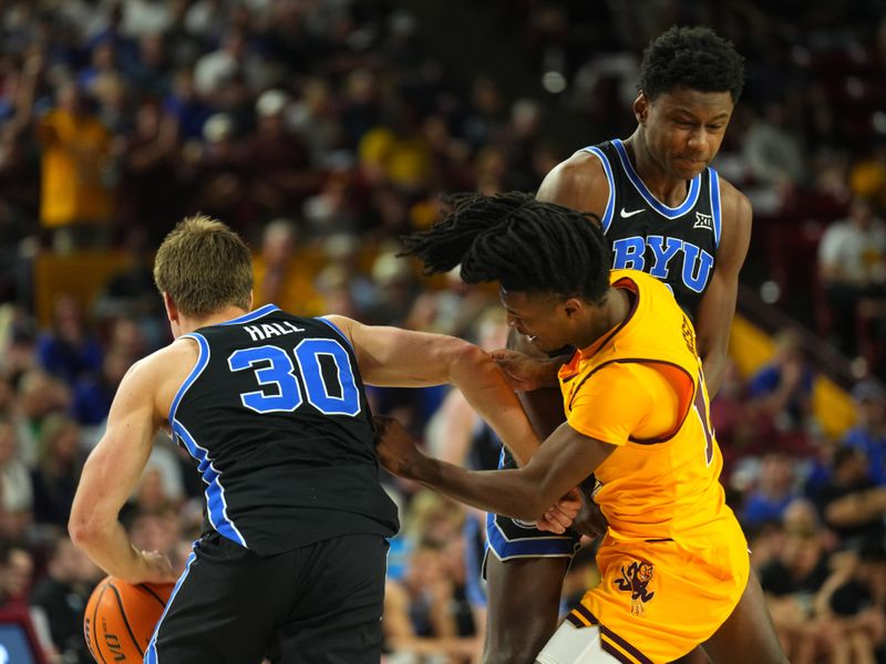 Feb 26, 2025; Tempe, Arizona, USA; Brigham Young Cougars forward Kanon Catchings (6) sets a pick for Brigham Young Cougars guard Dallin Hall (30) against Arizona State Sun Devils guard Tervor Best (12) during the second half at Desert Financial Arena. Mandatory Credit: Joe Camporeale-Imagn Images