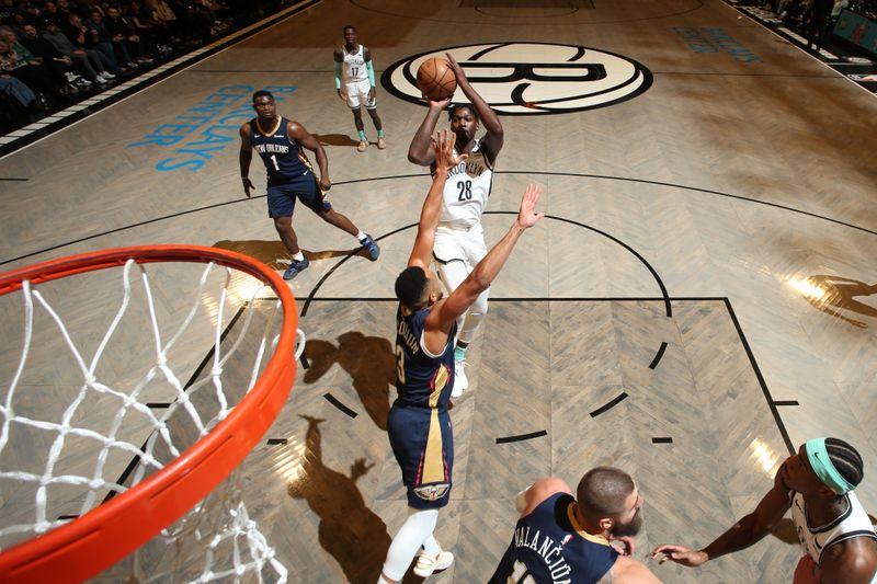 BROOKLYN, NY - MARCH 19: Dorian Finney-Smith #28 of the Brooklyn Nets shoots the ball during the game against the New Orleans Pelicans on March 19, 2024 at Barclays Center in Brooklyn, New York. NOTE TO USER: User expressly acknowledges and agrees that, by downloading and or using this Photograph, user is consenting to the terms and conditions of the Getty Images License Agreement. Mandatory Copyright Notice: Copyright 2024 NBAE (Photo by Nathaniel S. Butler/NBAE via Getty Images)