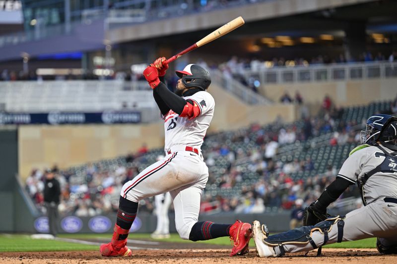 Apr 25, 2023; Minneapolis, Minnesota, USA; Minnesota Twins center fielder Byron Buxton (25) watches a two-run home run off New York Yankees starting pitcher Nestor Cortes (65) as catcher Jose Trevino (39) looks on during the sixth inning at Target Field. Mandatory Credit: Jeffrey Becker-USA TODAY Sports