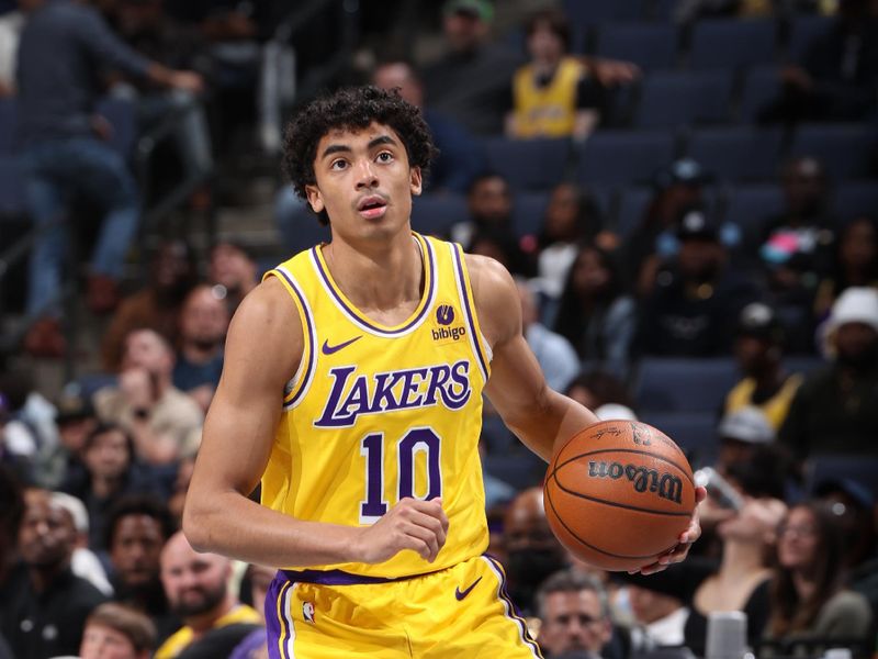 MEMPHIS, TN - MARCH 27: Max Christie #10 of the Los Angeles Lakers handles the ball during the game against the Memphis Grizzlies on March 27, 2024 at FedExForum in Memphis, Tennessee. NOTE TO USER: User expressly acknowledges and agrees that, by downloading and or using this photograph, User is consenting to the terms and conditions of the Getty Images License Agreement. Mandatory Copyright Notice: Copyright 2024 NBAE (Photo by Joe Murphy/NBAE via Getty Images)