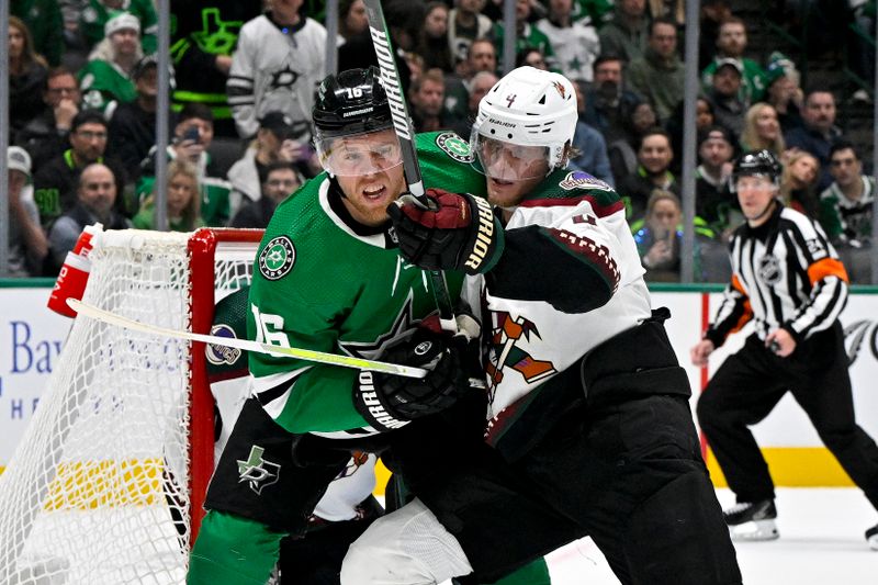 Nov 14, 2023; Dallas, Texas, USA; Dallas Stars center Joe Pavelski (16) battles for position in front of Arizona Coyotes goaltender Karel Vejmelka (70) and defenseman Juuso Valimaki (4) during the second period at the American Airlines Center. Mandatory Credit: Jerome Miron-USA TODAY Sports