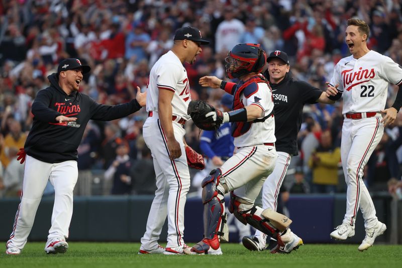 Oct 4, 2023; Minneapolis, Minnesota, USA; Minnesota Twins relief pitcher Jhoan Duran (59) celebrates with catcher Ryan Jeffers (27) after defeating Toronto Blue Jays during game two of the Wildcard series for the 2023 MLB playoffs at Target Field. Mandatory Credit: Jesse Johnson-USA TODAY Sports