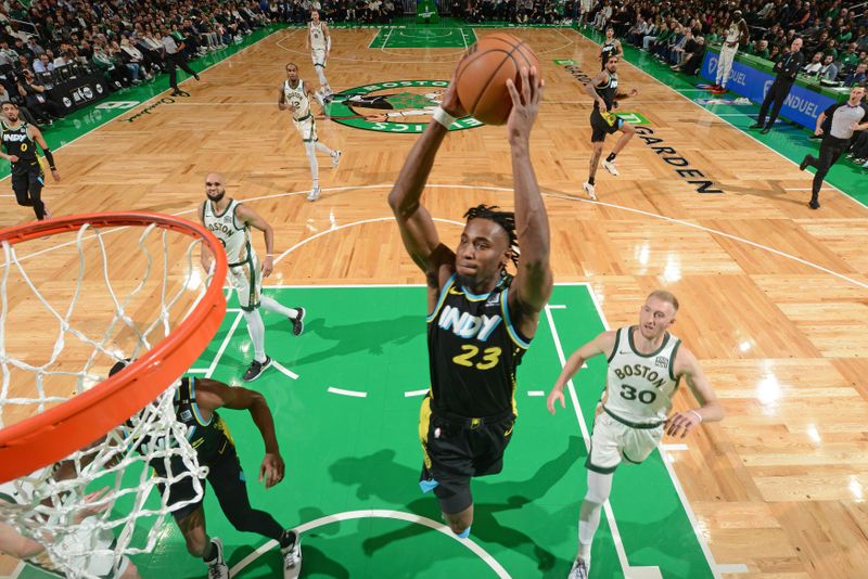 BOSTON, MA - JANUARY 30: Aaron Nesmith #23 of the Indiana Pacers drives to the basket during the game against the Boston Celtics on January 30, 2024 at the TD Garden in Boston, Massachusetts. NOTE TO USER: User expressly acknowledges and agrees that, by downloading and or using this photograph, User is consenting to the terms and conditions of the Getty Images License Agreement. Mandatory Copyright Notice: Copyright 2024 NBAE  (Photo by Brian Babineau/NBAE via Getty Images)