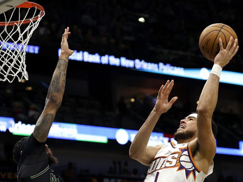 NEW ORLEANS, LOUISIANA - JANUARY 19: Devin Booker #1 of the Phoenix Suns shoots over Brandon Ingram #14 of the New Orleans Pelicans during the third quarter of an NBA game at Smoothie King Center on January 19, 2024 in New Orleans, Louisiana. NOTE TO USER: User expressly acknowledges and agrees that, by downloading and or using this photograph, User is consenting to the terms and conditions of the Getty Images License Agreement. (Photo by Sean Gardner/Getty Images)