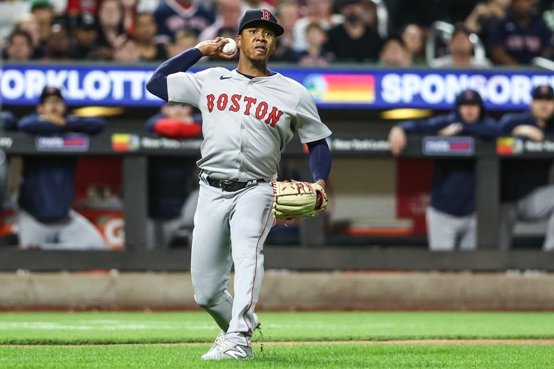 Sep 2, 2024; New York City, New York, USA;  Boston Red Sox starting pitcher Brayan Bello (66) throws a runner out at first base in the fourth inning against the New York Mets at Citi Field. Mandatory Credit: Wendell Cruz-USA TODAY Sports