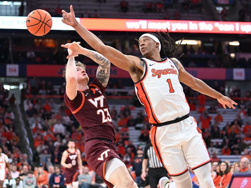 Feb 27, 2024; Syracuse, New York, USA; Syracuse Orange forward Maliq Brown (1) and Virginia Tech Hokies guard Tyler Nickel (23) reach for a loose ball in the second half at the JMA Wireless Dome. Mandatory Credit: Mark Konezny-USA TODAY Sports