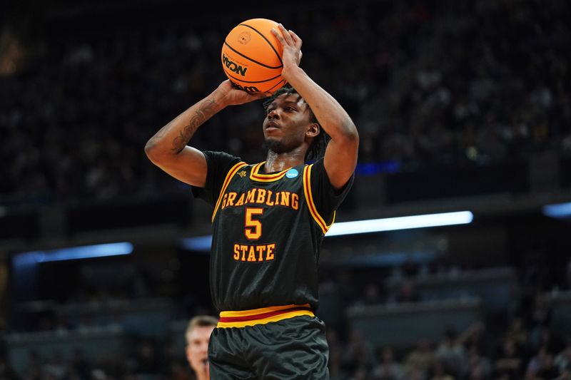 Mar 22, 2024; Indianapolis, IN, USA; Grambling State Tigers guard Tra'Michael Moton (5) takes a shot at the basket during the second half against the Grambling State Tigers in the first round of the 2024 NCAA Tournament at Gainbridge FieldHouse. Mandatory Credit: Robert Goddin-USA TODAY Sports