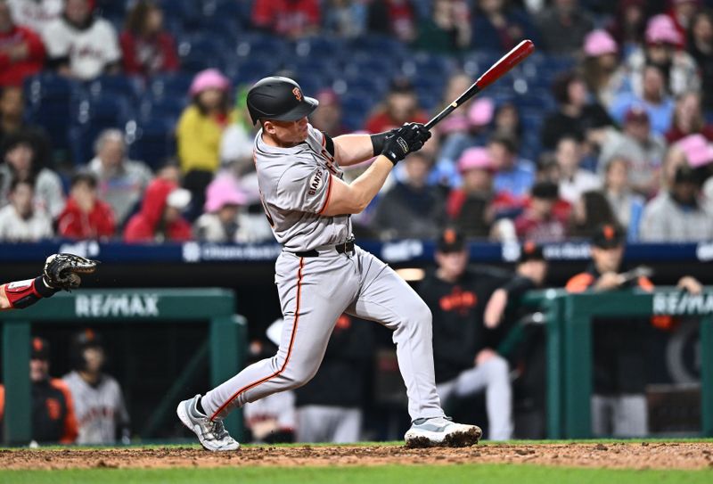 May 5, 2024; Philadelphia, Pennsylvania, USA; San Francisco Giants catcher Jakson Reetz (50) hits a home run against the Philadelphia Phillies in the ninth inning at Citizens Bank Park. Mandatory Credit: Kyle Ross-USA TODAY Sports