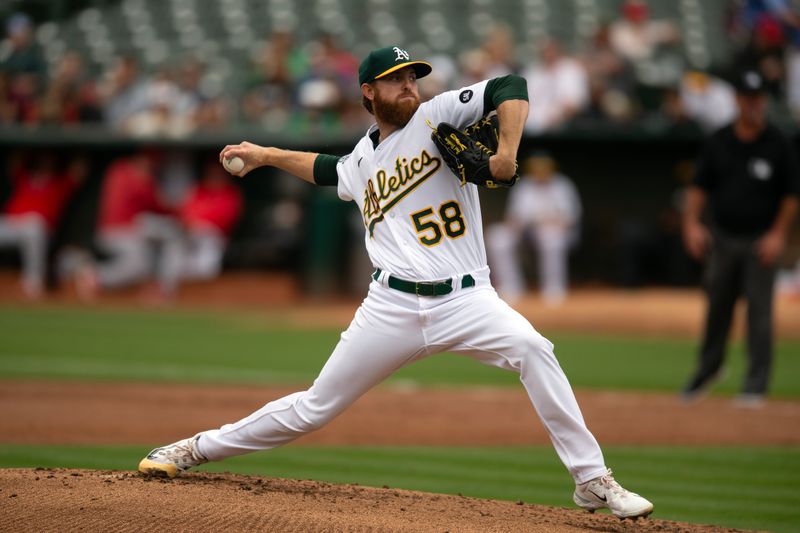 Sep 2, 2023; Oakland, California, USA; Oakland Athletics starting pitcher Paul Blackburn (58) delivers a pitch against the Los Angeles Angels during the second inning at Oakland-Alameda County Coliseum. Mandatory Credit: D. Ross Cameron-USA TODAY Sports