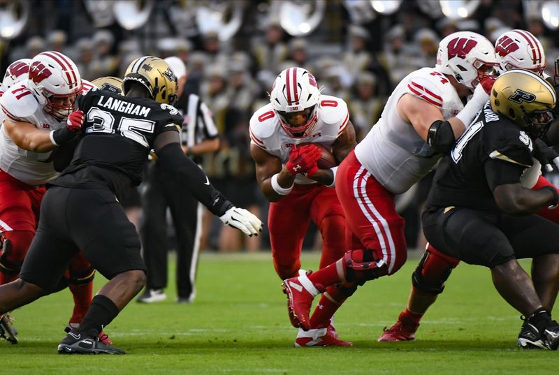 Sep 22, 2023; West Lafayette, Indiana, USA; Wisconsin Badgers running back Braelon Allen (0) runs the ball during the first half at Ross-Ade Stadium. Mandatory Credit: Robert Goddin-USA TODAY Sports