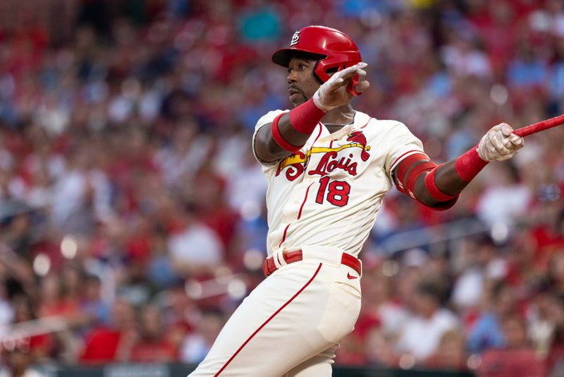 Sep 30, 2023; St. Louis, Missouri, USA; St. Louis Cardinals right fielder Jordan Walker (18) hits a two RBI double in the first inning at Busch Stadium. Mandatory Credit: Zach Dalin-USA TODAY Sports