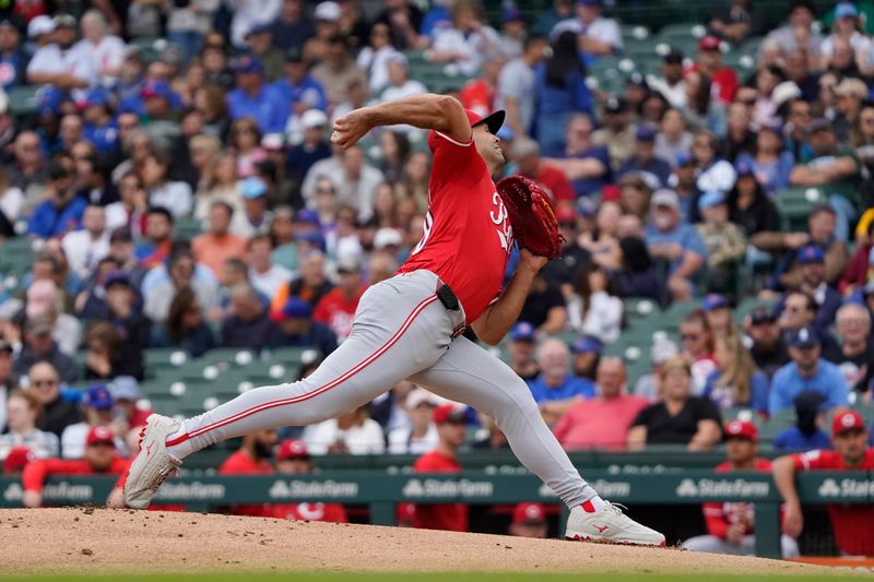 Sep 27, 2024; Chicago, Illinois, USA; Cincinnati Reds pitcher Nick Martinez (28) throws the ball against the Chicago Cubs during the first inning at Wrigley Field. Mandatory Credit: David Banks-Imagn Images