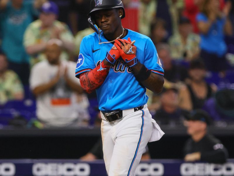 Jul 21, 2024; Miami, Florida, USA; Miami Marlins designated hitter Jazz Chisholm Jr. (2) reacts on his way to home plate after hitting a three-run home run against the New York Mets at loanDepot Park. Mandatory Credit: Sam Navarro-USA TODAY Sports