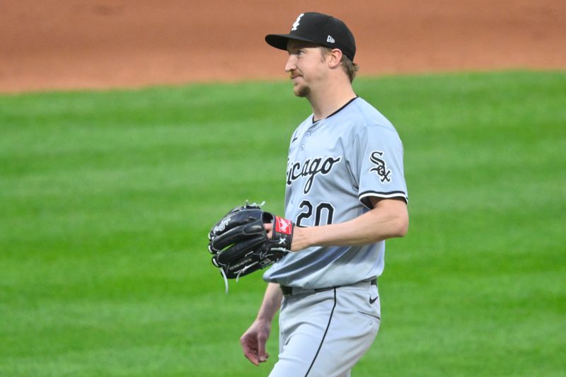 Apr 10, 2024; Cleveland, Ohio, USA; Chicago White Sox pitcher Erick Fedde (20) reacts in the fourth inning against the Cleveland Guardians at Progressive Field. Mandatory Credit: David Richard-USA TODAY Sports