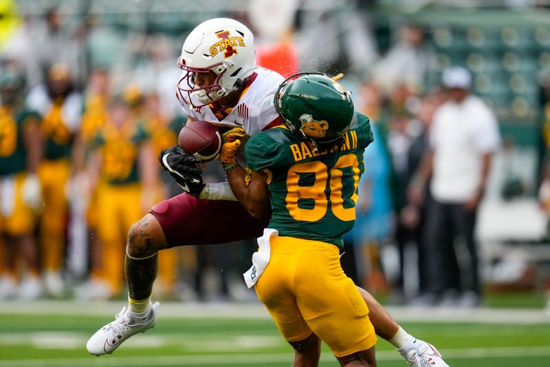 Oct 28, 2023; Waco, Texas, USA;  Iowa State Cyclones defensive back Malik Verdon (7) makes an interception against Baylor Bears wide receiver Monaray Baldwin (80) during the first half at McLane Stadium. Mandatory Credit: Chris Jones-USA TODAY Sports