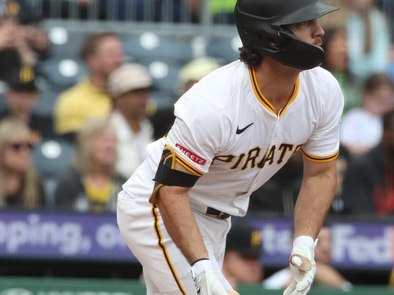 May 25, 2025; Pittsburgh, Pennsylvania, USA;  Pittsburgh Pirates second baseman Adam Frazier (26) hits an RBI single against the Milwaukee Brewers during the sixth inning at PNC Park. Mandatory Credit: Charles LeClaire-Imagn Images