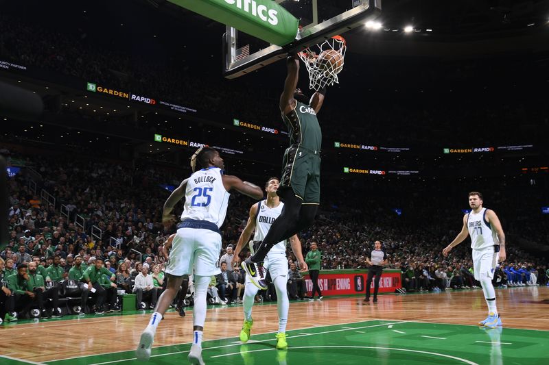 BOSTON, MA - NOVEMBER 23: Jaylen Brown #7 of the Boston Celtics dunks the ball during the game against the Dallas Mavericks on November 23, 2022 at the TD Garden in Boston, Massachusetts.  NOTE TO USER: User expressly acknowledges and agrees that, by downloading and or using this photograph, User is consenting to the terms and conditions of the Getty Images License Agreement. Mandatory Copyright Notice: Copyright 2022 NBAE  (Photo by Brian Babineau/NBAE via Getty Images)