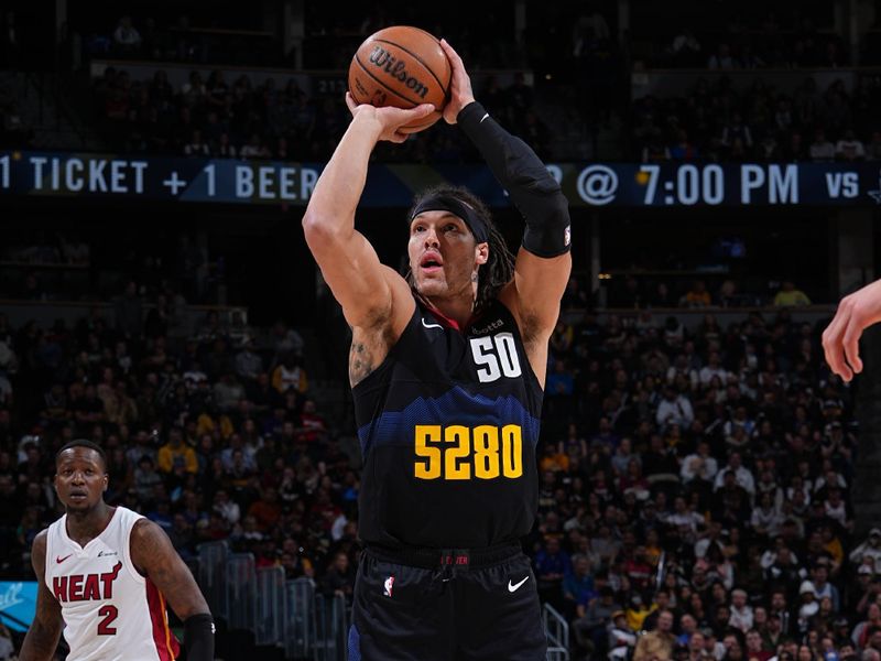 DENVER, CO - FEBRUARY 29: Aaron Gordon #50 of the Denver Nuggets shoots a free throw during the game against the Miami Heat on February 29, 2024 at the Ball Arena in Denver, Colorado. NOTE TO USER: User expressly acknowledges and agrees that, by downloading and/or using this Photograph, user is consenting to the terms and conditions of the Getty Images License Agreement. Mandatory Copyright Notice: Copyright 2024 NBAE (Photo by Garrett Ellwood/NBAE via Getty Images)