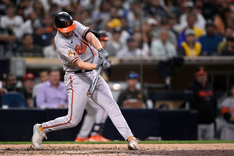 Aug 14, 2023; San Diego, California, USA; Baltimore Orioles second baseman Jordan Westburg (11) hits a single against the San Diego Padres during the fifth inning at Petco Park. Mandatory Credit: Orlando Ramirez-USA TODAY Sports