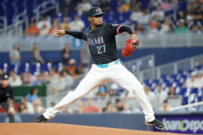 May 31, 2025; Miami, Florida, USA;  Miami Marlins starting pitcher Edward Cabrera (27) pitches against the San Francisco Giants during the first inning at loanDepot Park. Mandatory Credit: Rhona Wise-Imagn Images