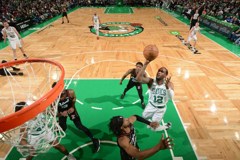 BOSTON, MA - MARCH 18: Oshae Brissett #12 of the Boston Celtics shoots the ball during the game against the Detroit Pistons on March 18, 2024 at the TD Garden in Boston, Massachusetts. NOTE TO USER: User expressly acknowledges and agrees that, by downloading and or using this photograph, User is consenting to the terms and conditions of the Getty Images License Agreement. Mandatory Copyright Notice: Copyright 2024 NBAE  (Photo by Brian Babineau/NBAE via Getty Images)