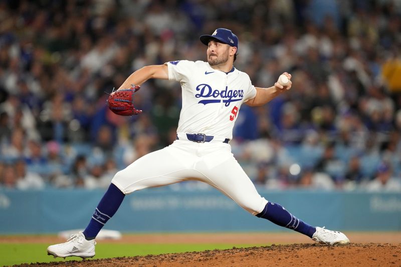 Sep 25, 2024; Los Angeles, California, USA; Los Angeles Dodgers relief pitcher Alex Vesia (51) throws in the sixth inning against the San Diego Padres at Dodger Stadium. Mandatory Credit: Kirby Lee-Imagn Images