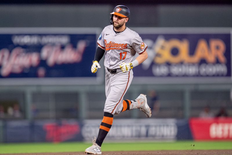 Sep 27, 2024; Minneapolis, Minnesota, USA; Baltimore Orioles left fielder Colton Cowser (17) runs after hitting a home run off Minnesota Twins pitcher Caleb Thielbar (56) in the seventh inning at Target Field. Mandatory Credit: Matt Blewett-Imagn Images