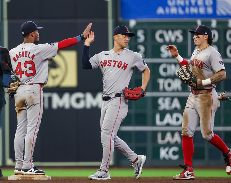 Aug 21, 2024; Houston, Texas, USA;  Boston Red Sox shortstop Ceddanne Rafaela (43) and teammates celebrate the win against the Houston Astros at Minute Maid Park. Mandatory Credit: Thomas Shea-USA TODAY Sports