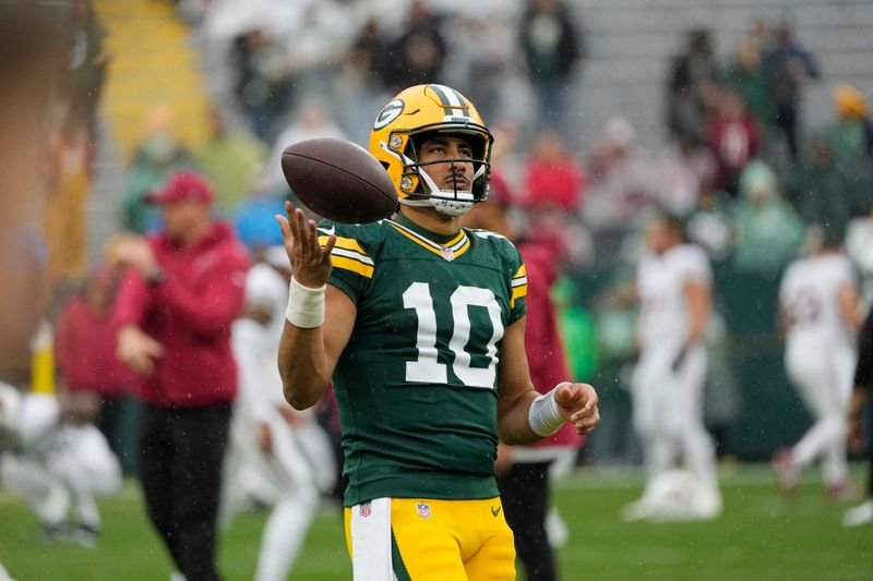 Green Bay Packers quarterback Jordan Love is seen during pregame of an NFL football game against the Arizona Cardinals, Sunday, Oct. 13, 2024, in Green Bay. (AP Photo/Morry Gash)