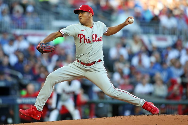 Oct 7, 2023; Cumberland, Georgia, USA; Philadelphia Phillies starting pitcher Ranger Suarez (55) pitches during the first inning against the Atlanta Braves during game one of the NLDS for the 2023 MLB playoffs at Truist Park. Mandatory Credit: Brett Davis-USA TODAY Sports