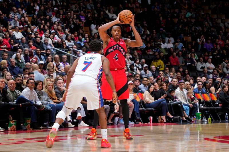 TORONTO, CANADA - OCTOBER 25: Scottie Barnes #4 of the Toronto Raptors looks to pass the ball during the game against the Philadelphia 76ers on October 25, 2024 at the Scotiabank Arena in Toronto, Ontario, Canada.  NOTE TO USER: User expressly acknowledges and agrees that, by downloading and or using this Photograph, user is consenting to the terms and conditions of the Getty Images License Agreement.  Mandatory Copyright Notice: Copyright 2024 NBAE (Photo by Mark Blinch/NBAE via Getty Images)