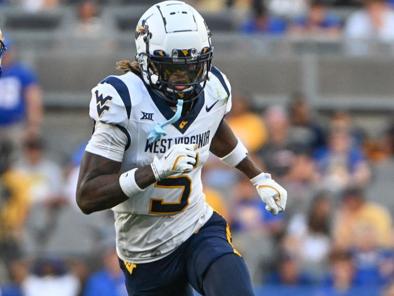 Sep 14, 2024; Pittsburgh, Pennsylvania, USA; West Virginia Mountaineers wide receiver Jaden Bray (5) runs against the Pittsburgh Panthers during the fourth quarter at Acrisure Stadium. Mandatory Credit: Barry Reeger-Image Images