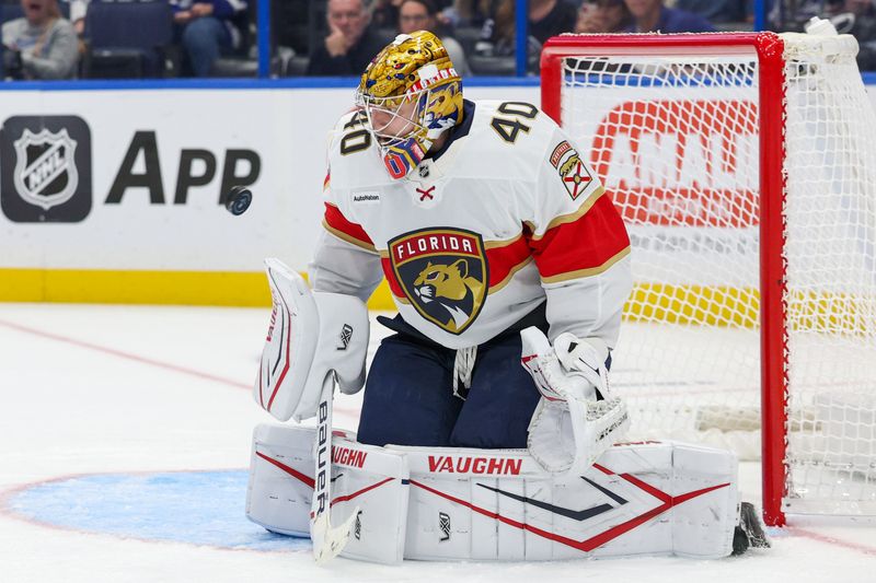 Oct 2, 2025; Tampa, Florida, USA; Tampa Bay Lightning center Conor Geekie (14) (not pictured) scores a goal past Florida Panthers goaltender Daniil Tarasov (40) in the third period  at Benchmark International Arena. Mandatory Credit: Nathan Ray Seebeck-Imagn Images