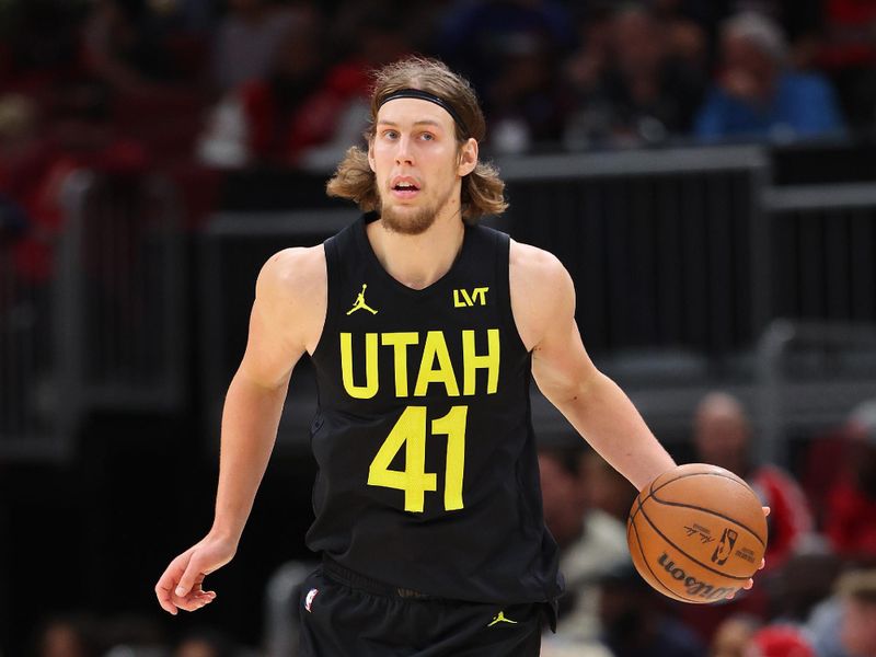 CHICAGO, ILLINOIS - NOVEMBER 06: Kelly Olynyk #41 of the Utah Jazz dribbles against the Chicago Bulls during the second half at the United Center on November 06, 2023 in Chicago, Illinois. NOTE TO USER: User expressly acknowledges and agrees that, by downloading and or using this photograph, User is consenting to the terms and conditions of the Getty Images License Agreement. (Photo by Michael Reaves/Getty Images)