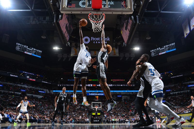SAN ANTONIO, TX - NOVEMBER 2: Naz Reid #11 of the Minnesota Timberwolves drives to the basket during the game against the San Antonio Spurs on November 2, 2024 at the Frost Bank Center in San Antonio, Texas. NOTE TO USER: User expressly acknowledges and agrees that, by downloading and or using this photograph, user is consenting to the terms and conditions of the Getty Images License Agreement. Mandatory Copyright Notice: Copyright 2024 NBAE (Photos by Michael Gonzales/NBAE via Getty Images)