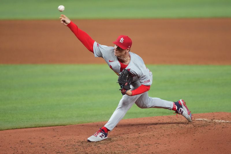 Jun 17, 2024; Miami, Florida, USA;  St. Louis Cardinals starting pitcher Sonny Gray (54) pitches in the fourth inning against the Miami Marlins at loanDepot Park. Mandatory Credit: Jim Rassol-USA TODAY Sports