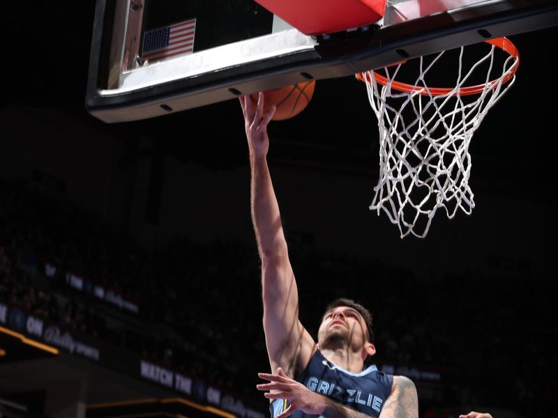 MINNEAPOLIS, MN -  JANUARY 18: John Konchar #46 of the Memphis Grizzlies drives to the basket during the game against the Minnesota Timberwolves on January 18, 2024 at Target Center in Minneapolis, Minnesota. NOTE TO USER: User expressly acknowledges and agrees that, by downloading and or using this Photograph, user is consenting to the terms and conditions of the Getty Images License Agreement. Mandatory Copyright Notice: Copyright 2024 NBAE (Photo by David Sherman/NBAE via Getty Images)