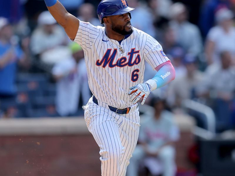 Apr 23, 2025; New York City, New York, USA; New York Mets designated hitter Starling Marte (6) celebrates his walkoff RBI single against the Philadelphia Phillies during the tenth inning at Citi Field. Mandatory Credit: Brad Penner-Imagn Images