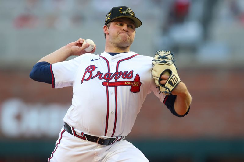 May 19, 2024; Atlanta, Georgia, USA; Atlanta Braves starting pitcher Bryce Elder (55) throws against the San Diego Padres in the first inning at Truist Park. Mandatory Credit: Brett Davis-USA TODAY Sports
