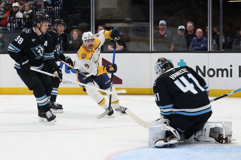 Dec 29, 2025; Salt Lake City, Utah, USA; Nashville Predators left wing Filip Forsberg (9) has a shot blocked by Utah Mammoth goaltender Vitek Vanecek (41) during the second period at Delta Center. Mandatory Credit: Rob Gray-Imagn Images